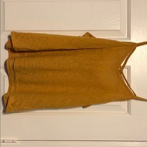 Light blue AND mustard color tank tops. Both XL.